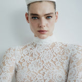 CATROUX MINI PEPLUM DRESS IN CHANTILLY LACE